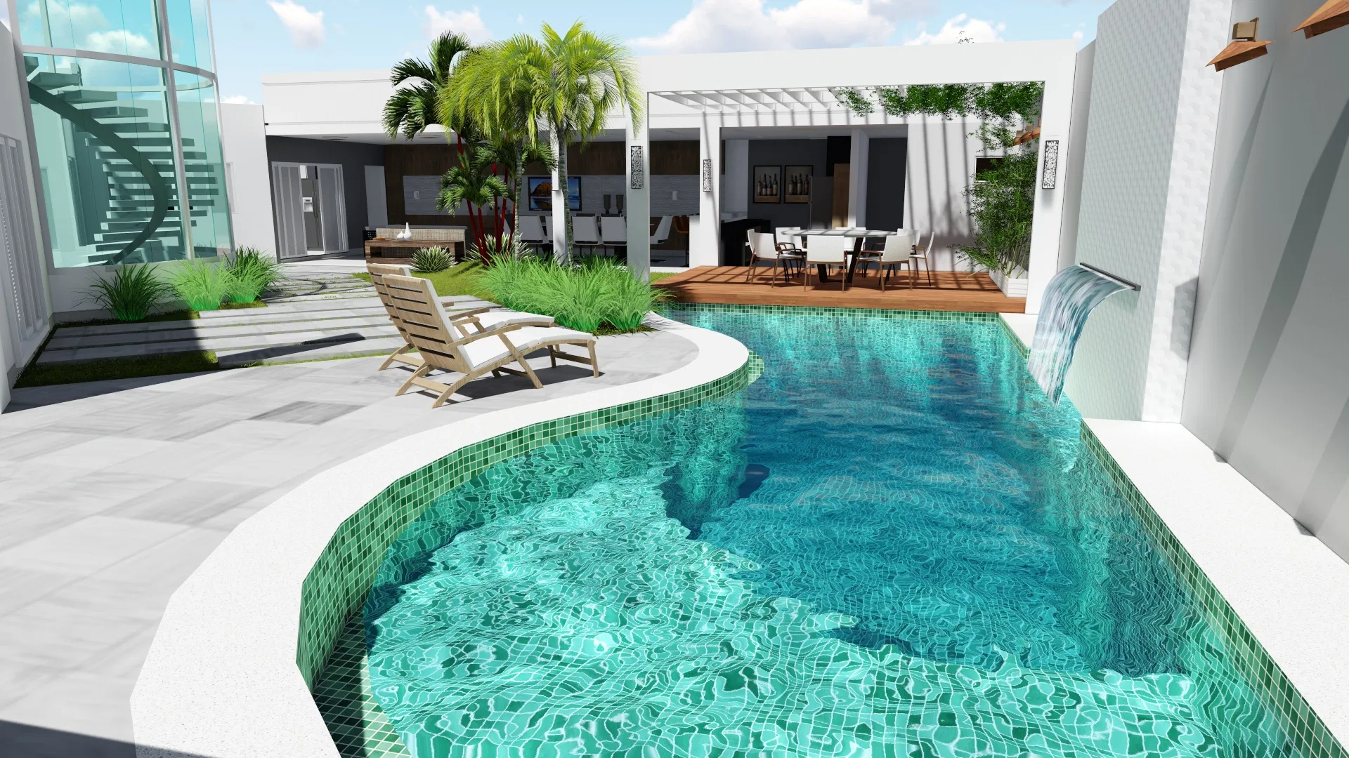 Piscina curva revestida em pastilha verde, com escoa d'água na borda, espreguiçadeiras de madeira no deck e área gourmet coberta ao fundo, junto à escada helicoidal em cilindro de vidro