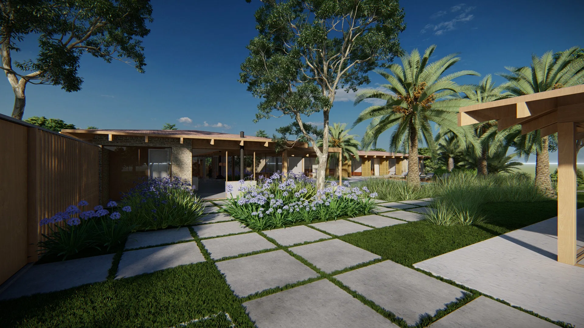 Jardim de acesso com placas de concreto e juntas gramadas, canteiros de agapantos e a casa térrea com brise de madeira ao fundo.