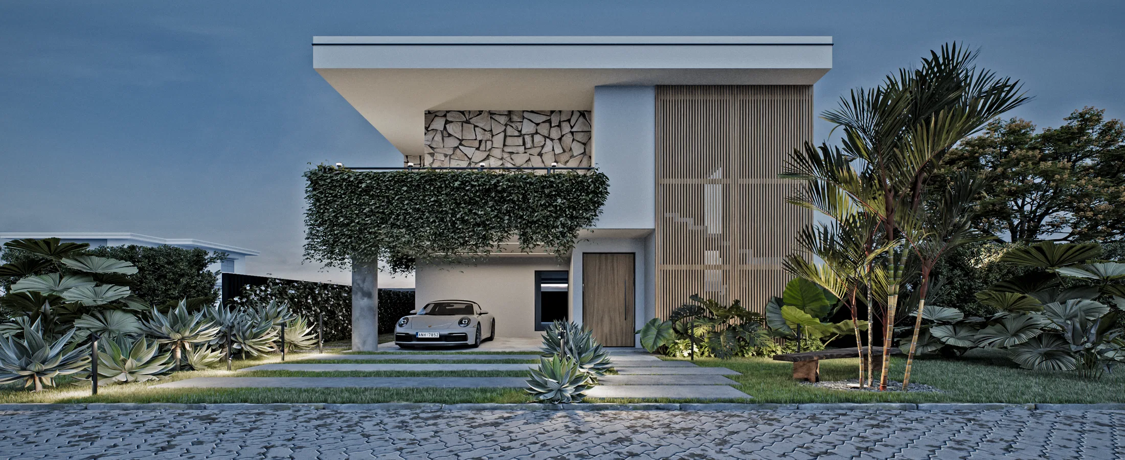 Casa moderna de dois pavimentos ao anoitecer, com laje em balanço, pedra e ripado, carro esportivo na garagem e jardim frontal de suculentas.