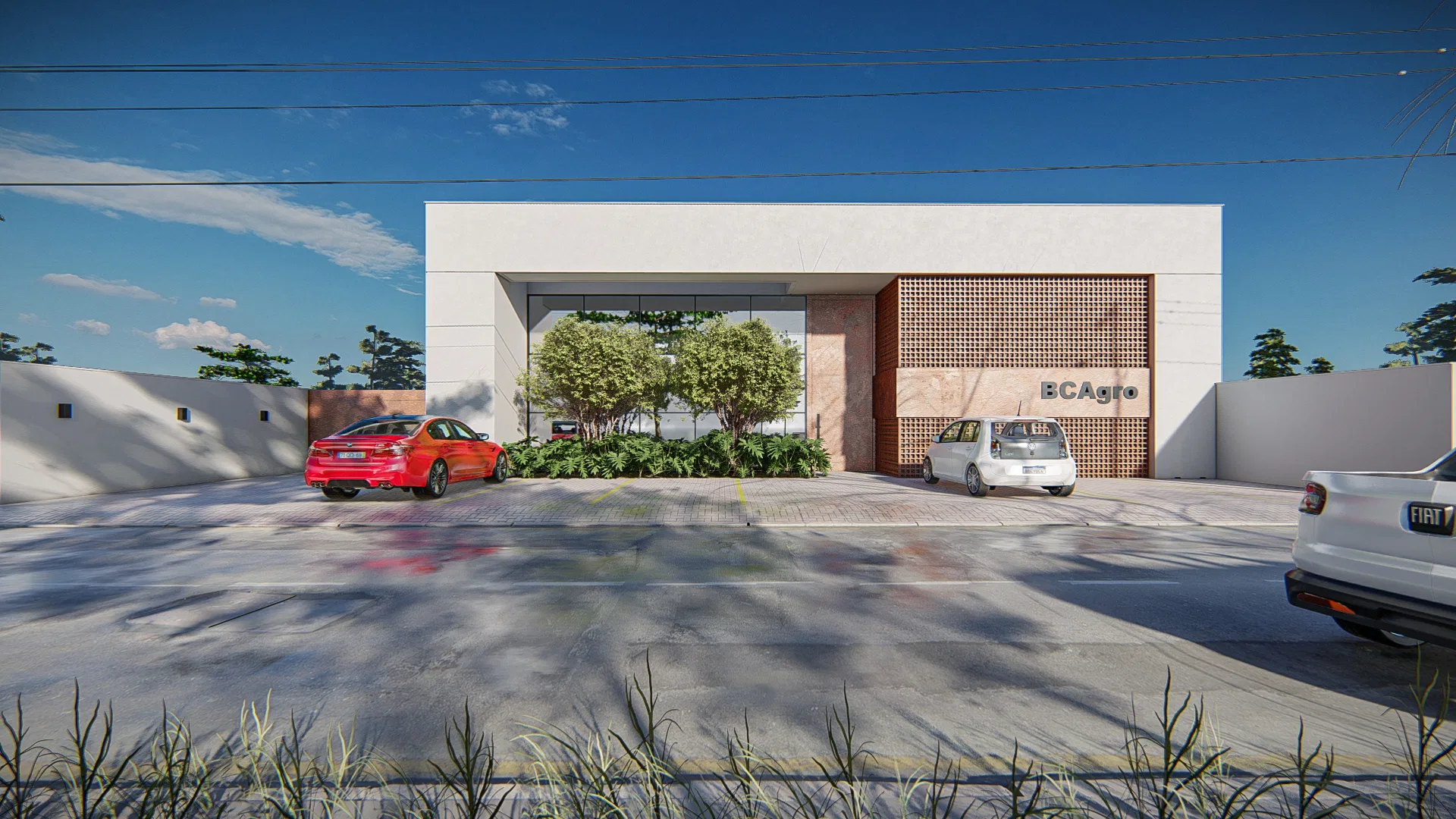 Fachada da sede comercial em volume branco com letreiro BCAgro, painel vazado de madeira e ilha ajardinada de arbustos topiados, carros estacionados à frente