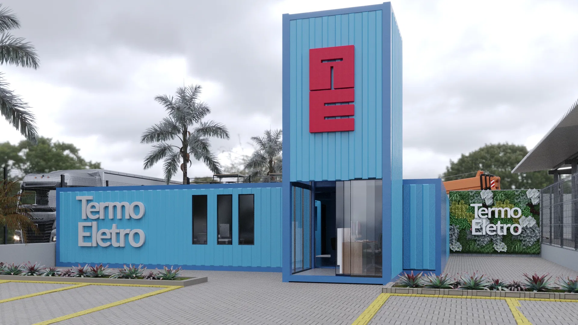 Fachada de acesso em containers azuis com torre central de painel vermelho e monograma, letreiro 'Termo Eletro' em relevo e painel verde à direita, sobre estacionamento demarcado