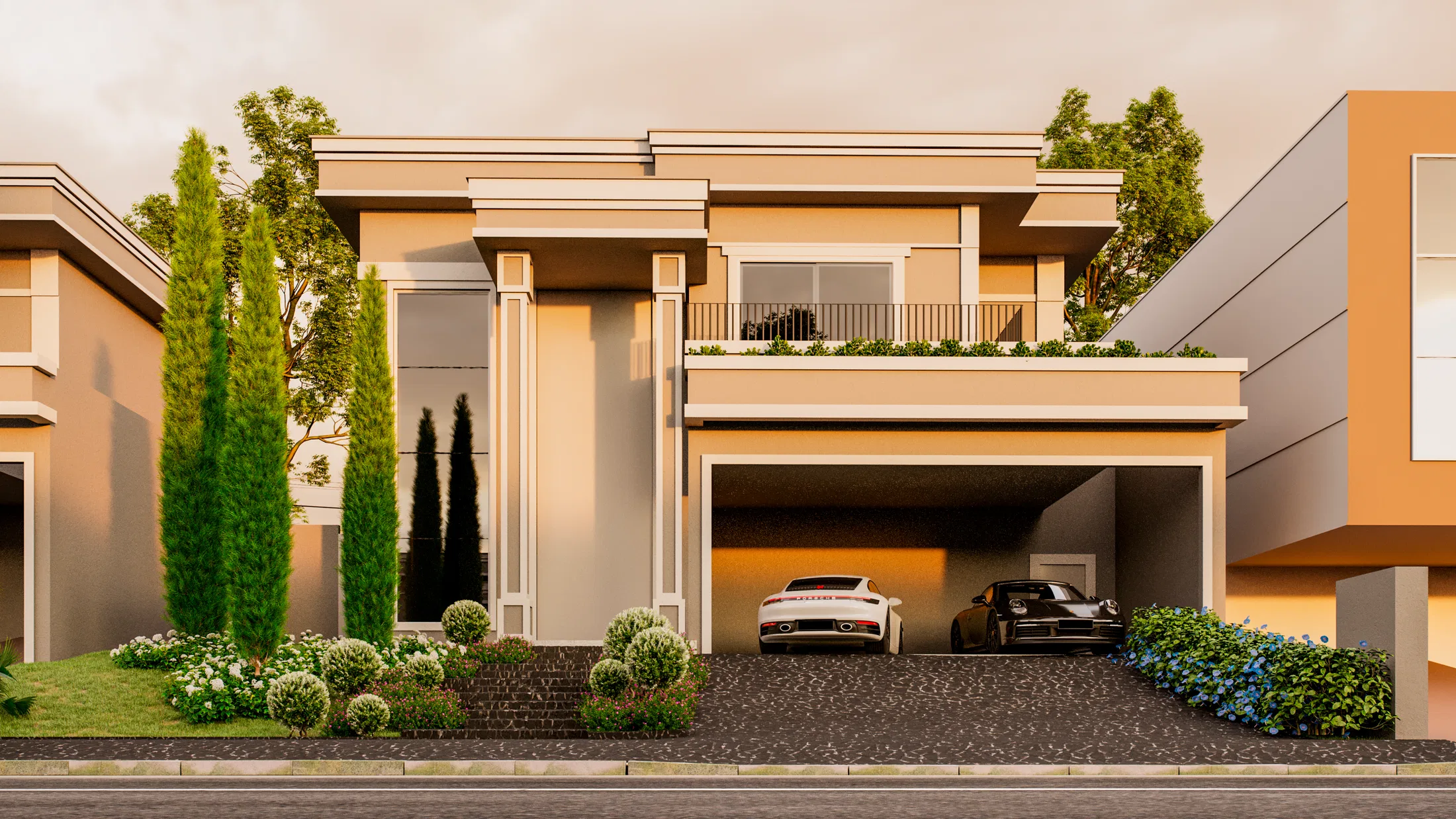 Fachada de sobrado ao entardecer com ciprestes-italianos, jardim frontal florido e dois carros na garagem
