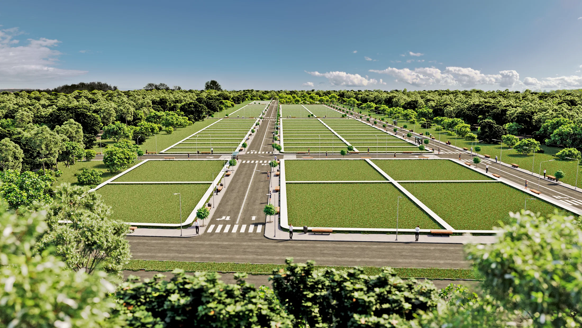 Vista elevada de um loteamento com quadras de lotes gramados divididos por avenidas pavimentadas, faixas de pedestres e mata no entorno