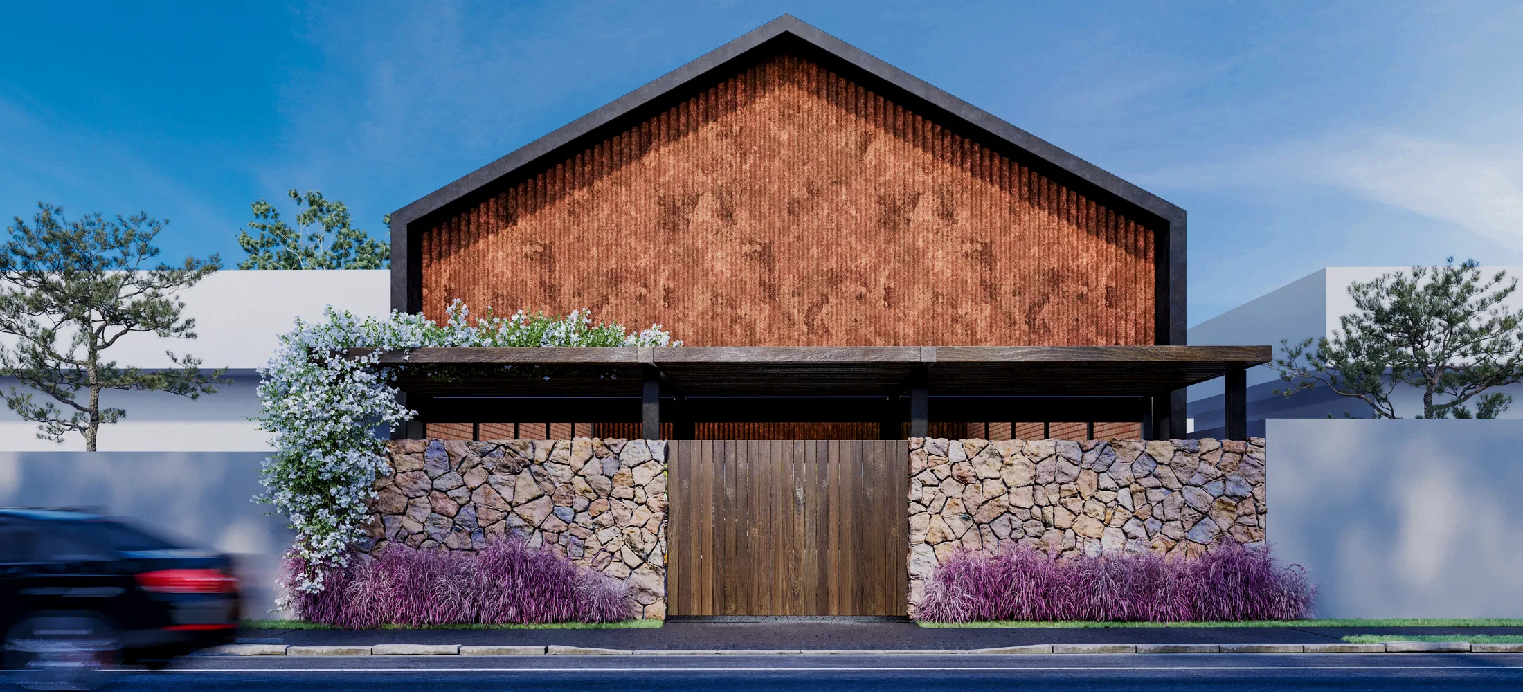 Fachada de galpão em duas águas, com empena ripada de madeira sobre tijolo, base em pedra, portão de madeira e gramíneas roxas.
