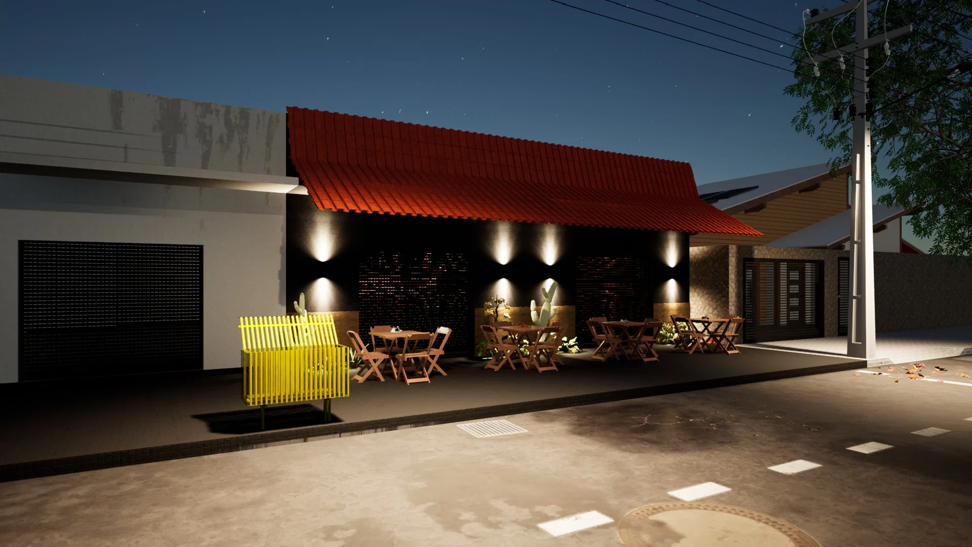 Fachada noturna de telhado cerâmico vermelho iluminada por arandelas, com pátio de mesas de madeira, banco amarelo e pavimento em primeiro plano